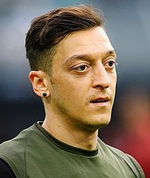 How tall is Mesut Ozil?